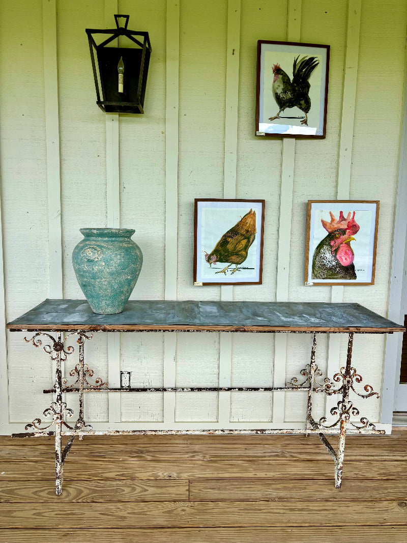 Vintage-style table METAL over wood surface and decorative legs for repotting plants