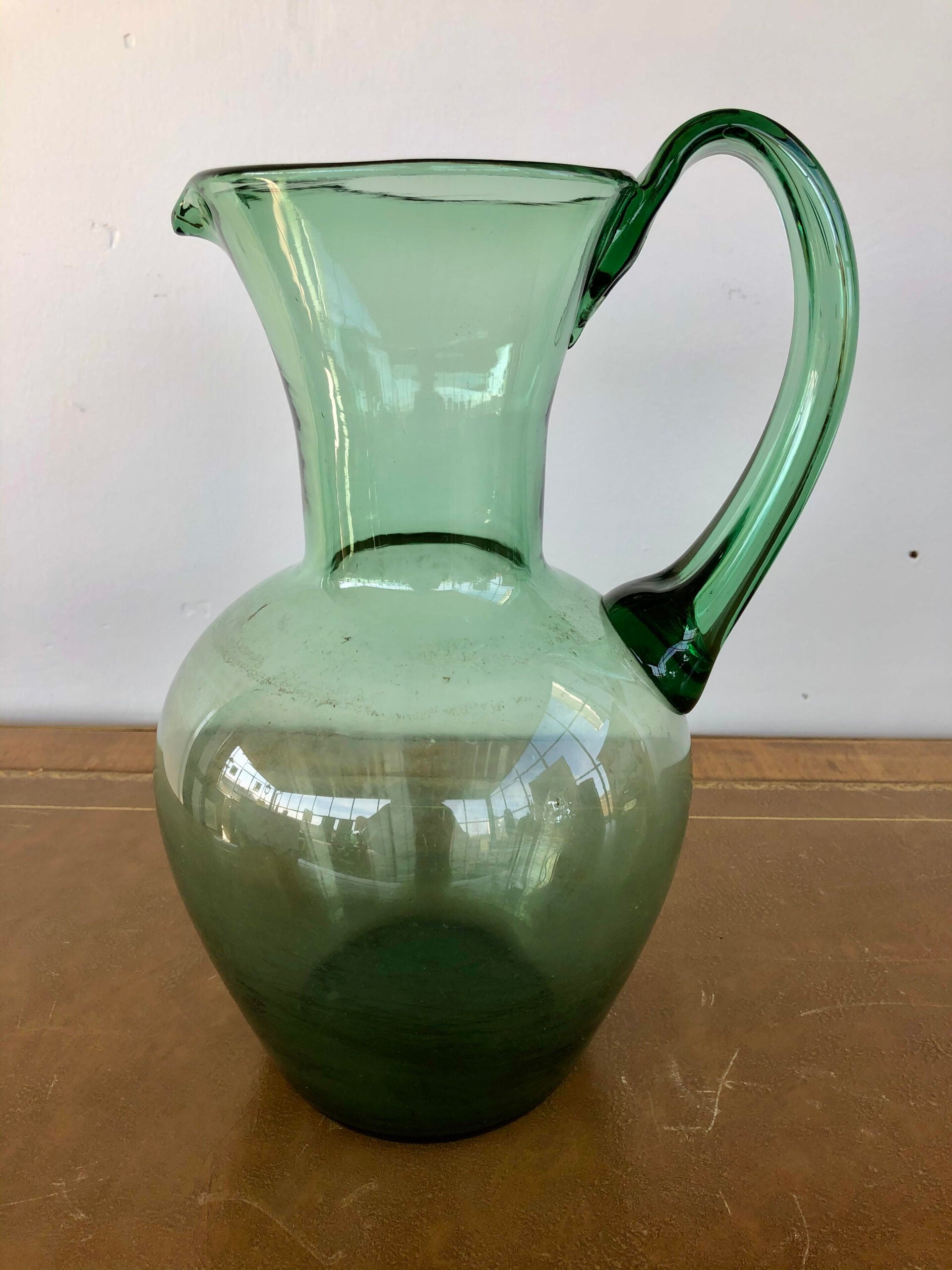 Green glass jug