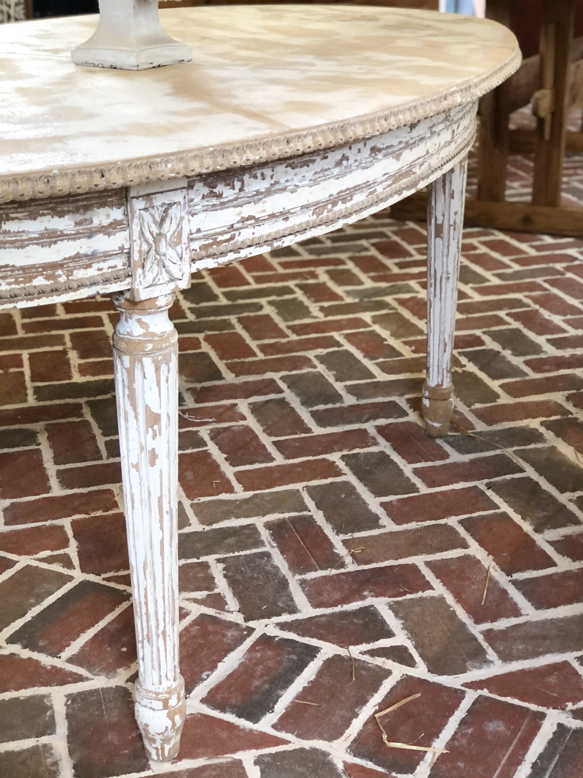 Small whitewashed dining table with fluted legs2