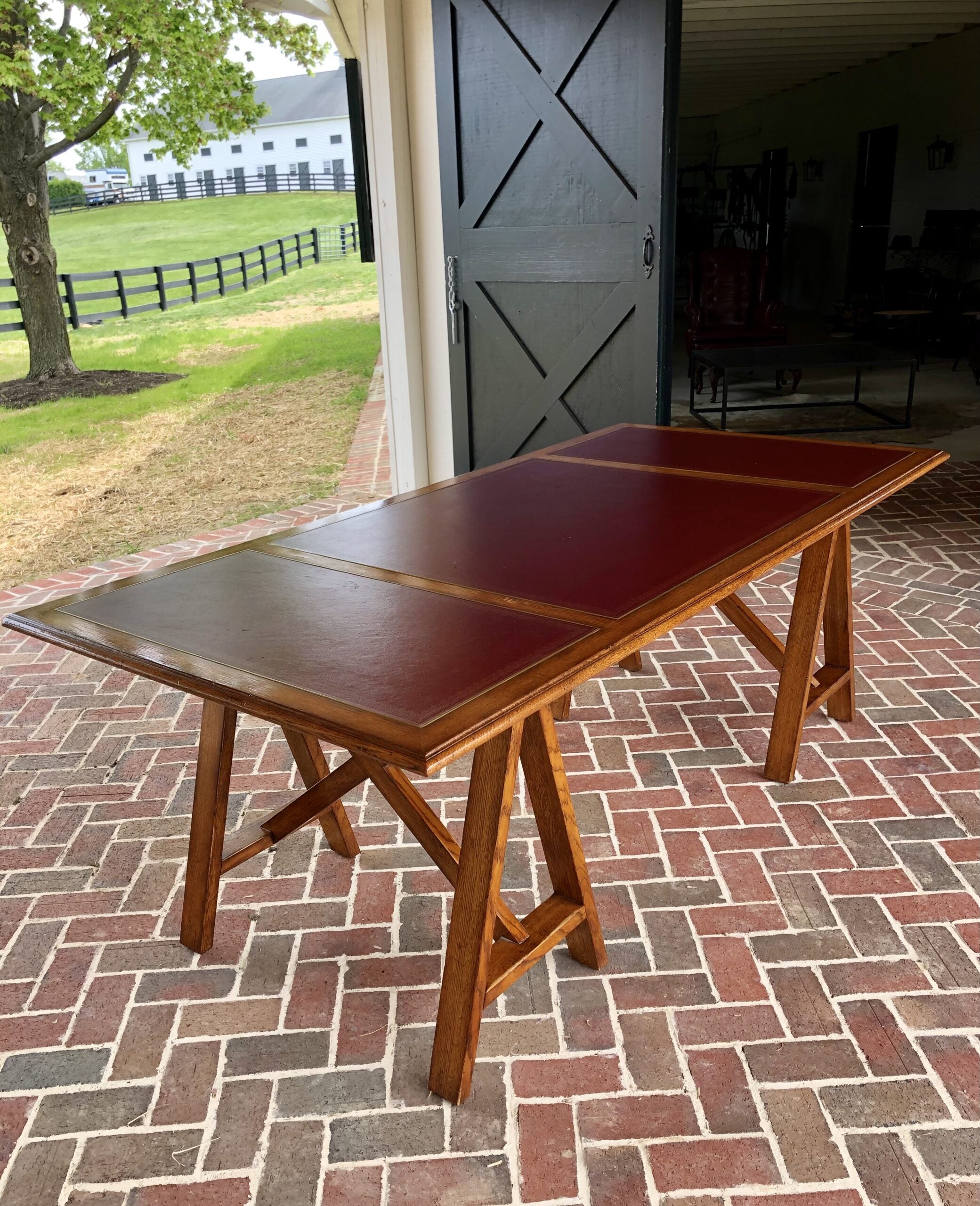 Table on Saw horses with red leather top4
