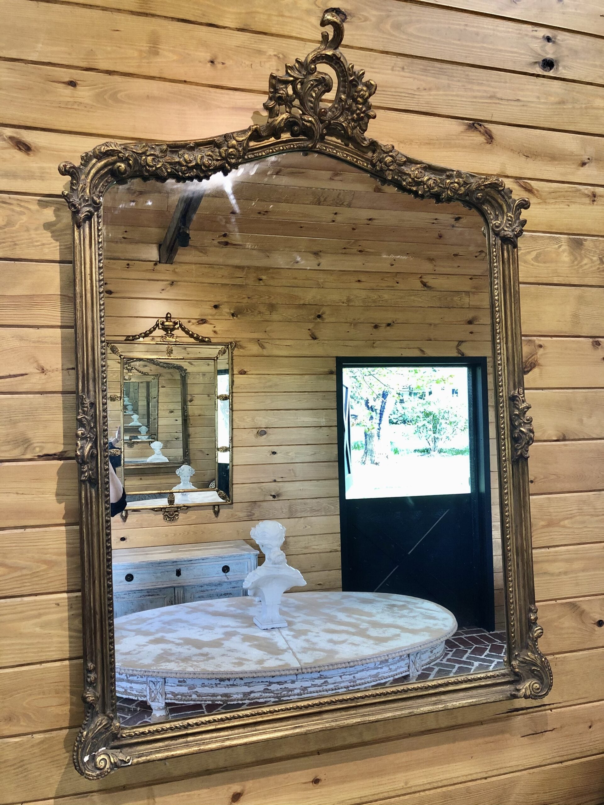 gold mirror with detailed top