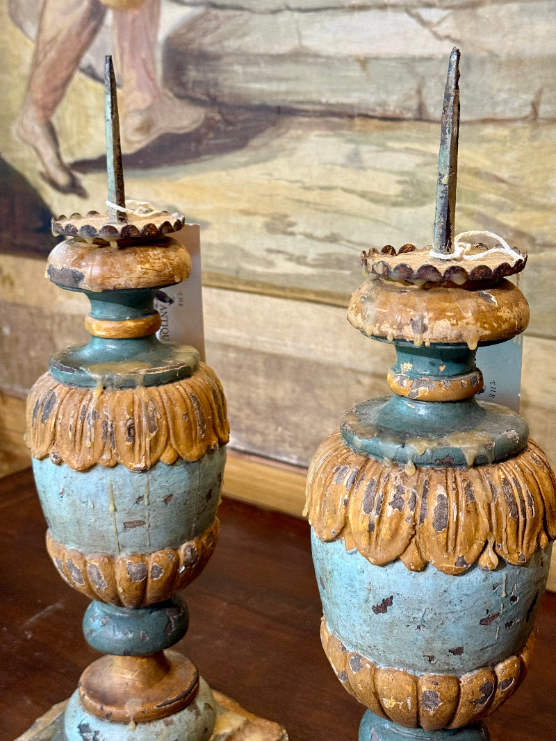 Pair of ornate Italian candle holders with a rustic patina