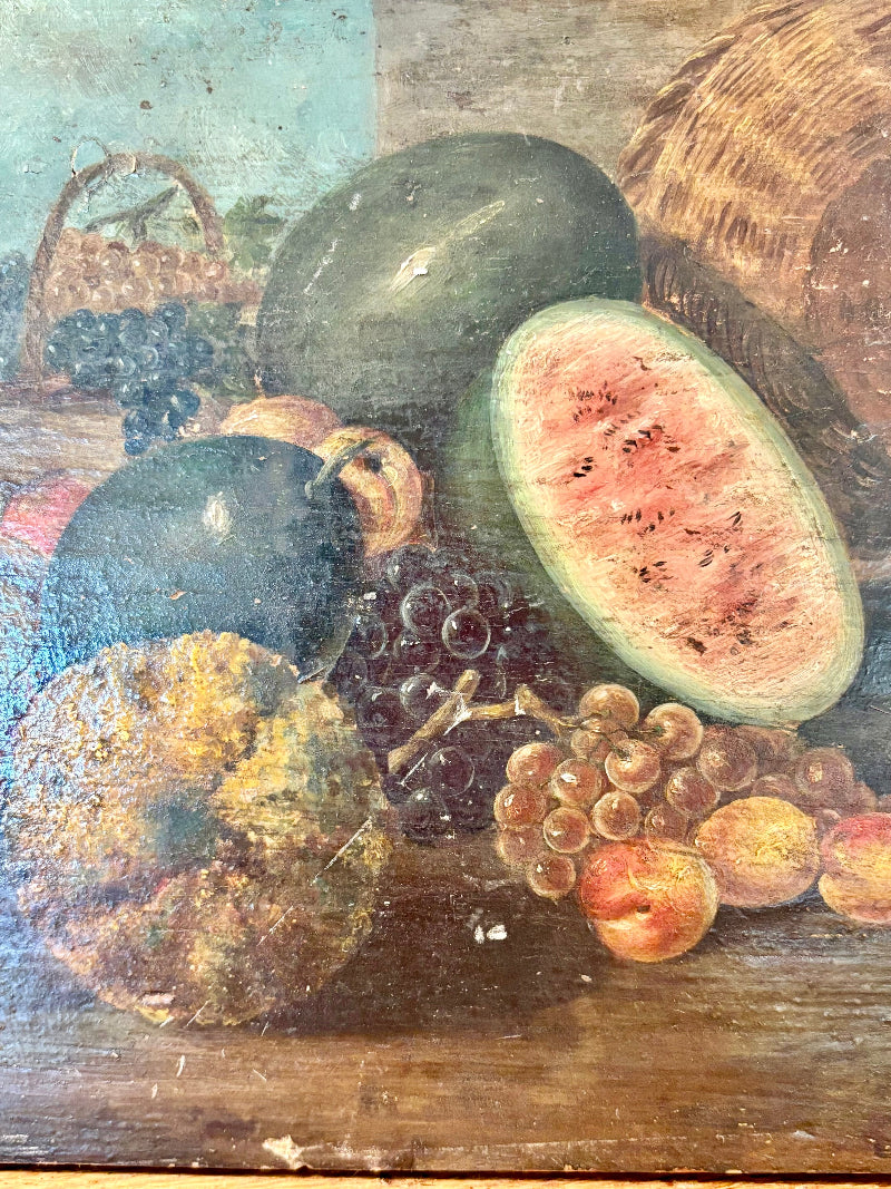 Still life painting of fruits including watermelon, grapes, and peaches on a wooden surface.