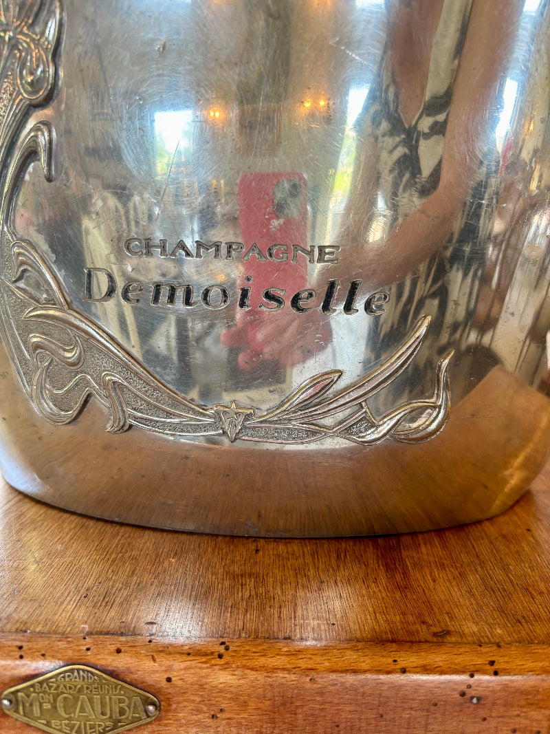 Silver champagne cooler with 'Champagne Demoiselle' monogrammed 