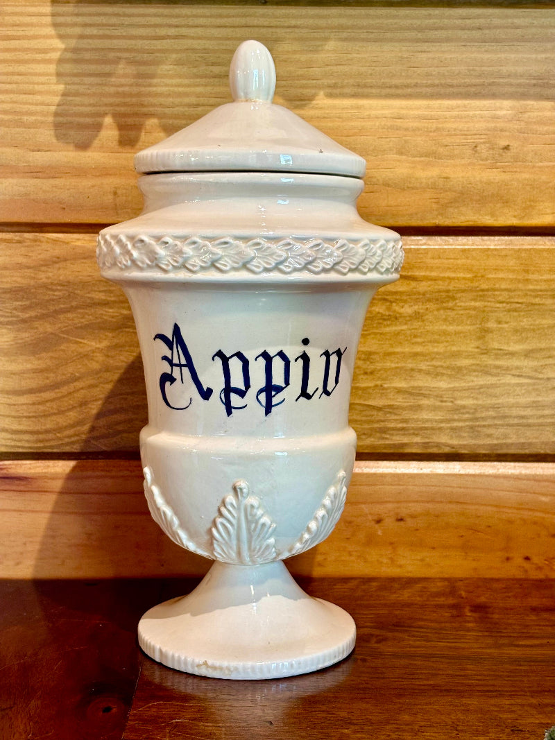 Venetian authentic apothecary jar  with a lid on a wooden surface