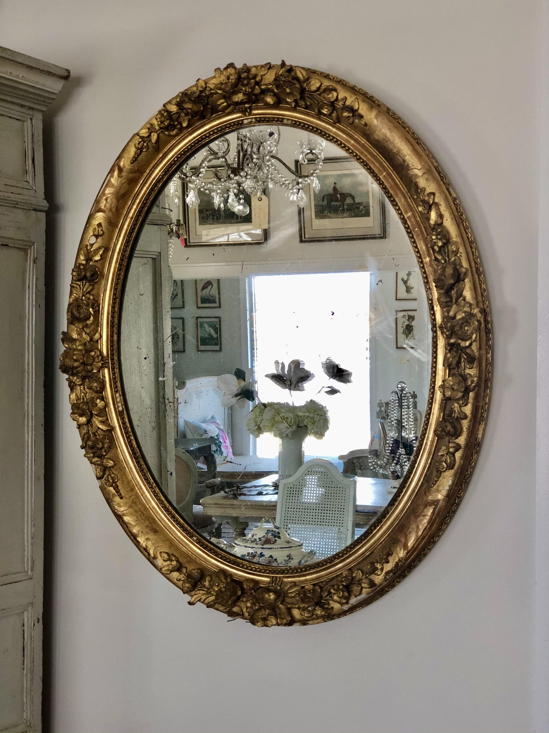 Pair oval gilded mirrors
