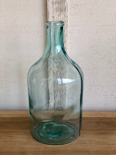 glass bottle with greenish hue